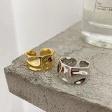 Carved In Zin Alloy Rings