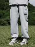 A guy wearing grey AirPods Pants