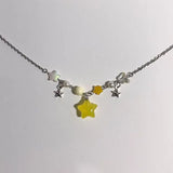 Front view of the yellow Celestial Starburst Necklace 