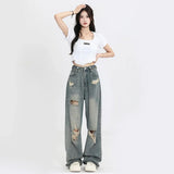Model wearing the blue Ripped Hole-Knee Baggy Jeans