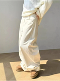 Model wearing the beige Flowy Freedom Pants