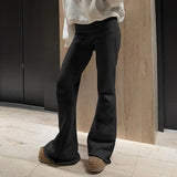 Model wearing the black Flare Fusion Elegance Pants