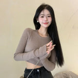 Model wearing the khaki Long-Sleeve Ribbed Crop Sweater
