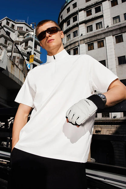 Model wearing the white The Urban Zip T-Shirt
