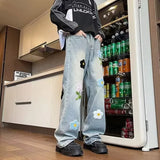 Model wearing the blue Retro Flower Embroidered Jeans 