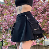 Model wearing the black Gothic Pleated Mini Skirt