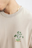 Model wearing the khaki Character Platform T-Shirt 