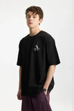 Model waring the black Margaret Graphic T-Shirt
