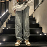 Model wearing the blue Star Embroidered Baggy Denim Jeans 