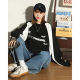 Model wearing the black Urban Adventure Sweatshirt