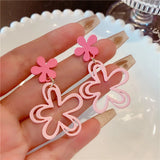 Front view of the pink Bloom Cascade Earrings