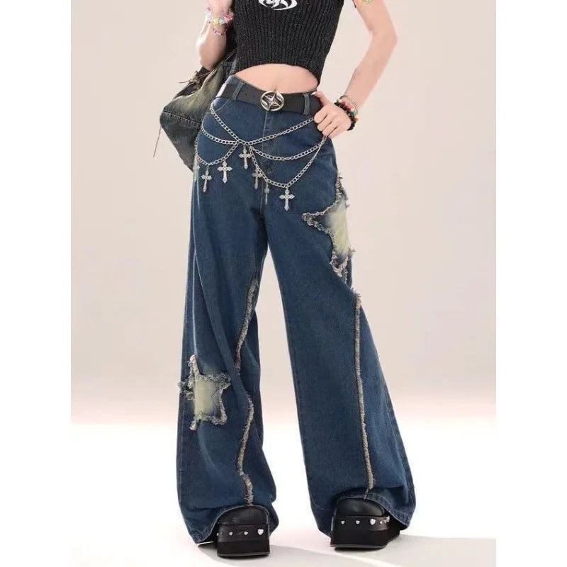 Model wearing the blue Distressed Star Patch Flare Jeans 