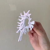 Front view of the pink Intricate Mettalic Hair Claw