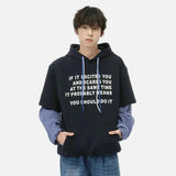 Model wearing the dark blue Motivational Quote Hoodie