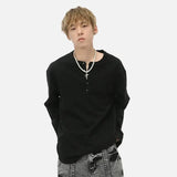 Model wearing the black Zipper Neck Pullover Sweatshirt