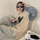 Cozy Patchwork Asymmetric Hem Sweater