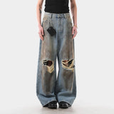 Distressed Vintage Wide Leg Spray Jeans