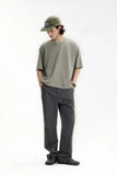 Model wearing the dark gray Men's Straight-Leg Chino Pants