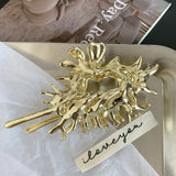 Front view of the gold Intricate Mettalic Hair Claw