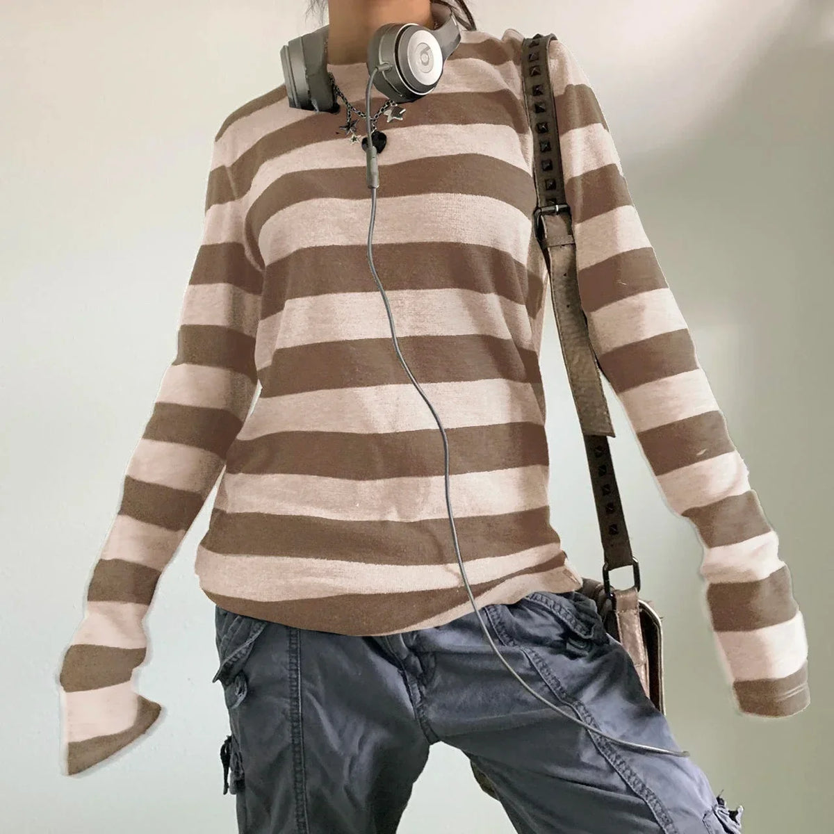 Model wearing the brown Artisan's Craft T-Shirt