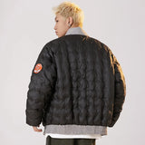 A model showing the back view of the black  Vintage Parkas Bomber Varsity Jacket
