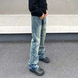 Vintage Distressed Blue Denim Flared Jeans