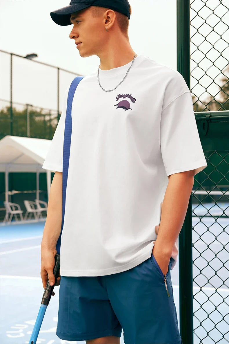 Model wearing the white Epic Voyage T-Shirt