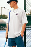 Model wearing the white Epic Voyage T-Shirt