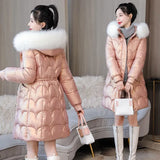 Model wearing the pink Women's Long Quilted Puffer Jacket