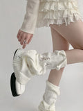 Model wearing the white Knee-High Leg Warmers