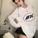 Model wearing the white interstellar Knit Reverie Sweater