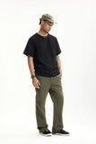 Model wearing the green Men's Straight-Leg Chino Pants