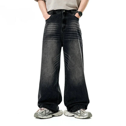 Model wearing the black Retro Freedom Fit Jeans in a gray background