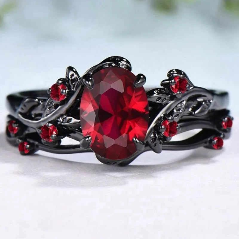 Exquisite Black Round Flower Red Stone Ring