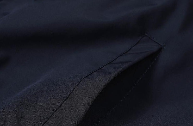 A pocket of the Windbreaker Women's Jacket