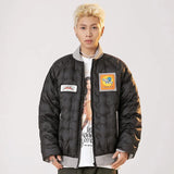 A model wearing the black Vintage Parkas Bomber Varsity Jacket