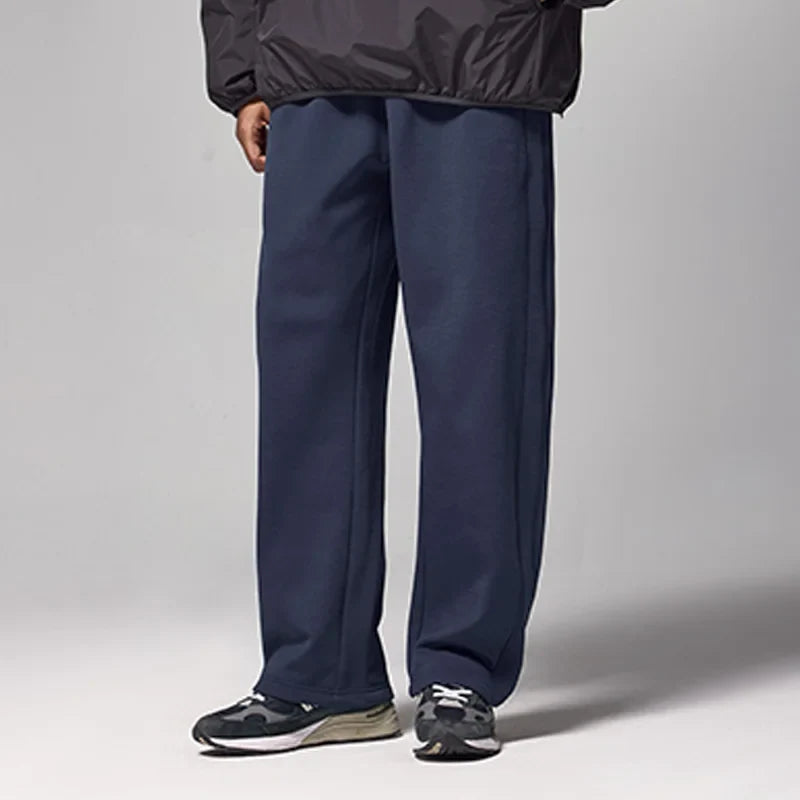 Model wearing the blue Urban Comfort Sweatpants 