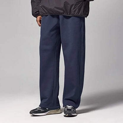 Model wearing the blue Urban Comfort Sweatpants 