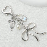 Front view of the Heart & Bow Butterfly Keychain 