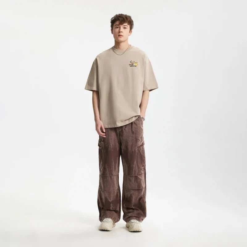 Model wearing the khaki Iconic Pulse T-Shirt
