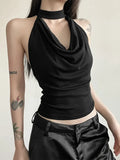Model wearing the black Mystic Muse Halter Top