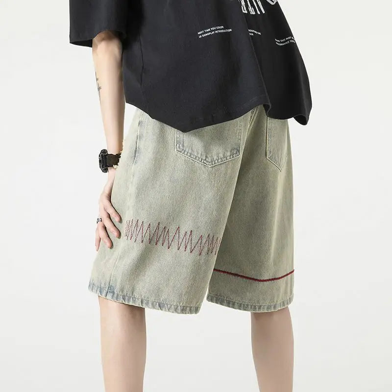 Stylish Spliced Button Zipper Ripped Shorts