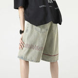 Stylish Spliced Button Zipper Ripped Shorts