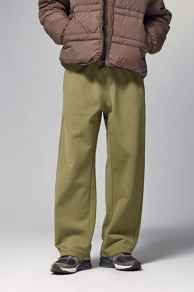 Model wearing the green Urban Comfort Sweatpants 