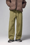 Model wearing the green Urban Comfort Sweatpants 