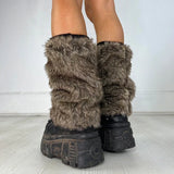 Model wearing the brown Cozy Knit Leg Warmers