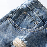 Blue Distressed Flared Denim Jeans