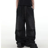 Model wearing the black Velvet Street Baggy Pants