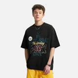 Model wearing the black Style Sphere T-Shirt in a gray background