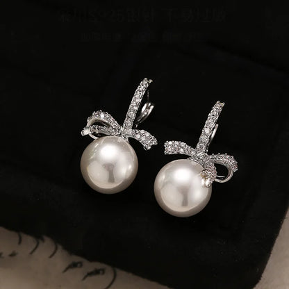 Dazzling Bowtie Ribbon Pearl Clear CZ Errings